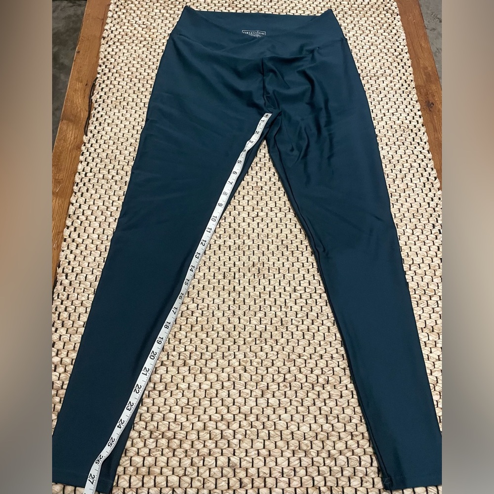Obsession Teal “butt scrunch” booty defining, criss cross waist band leggings